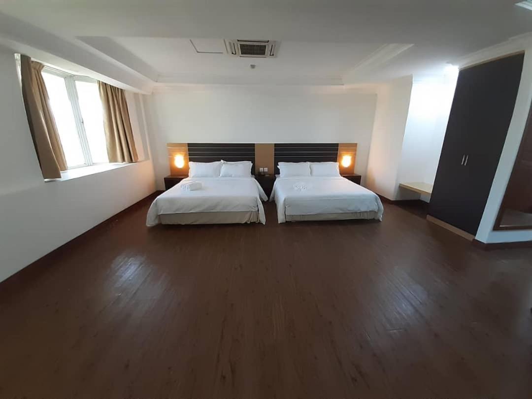 Sara Hotel Labuan Kültér fotó